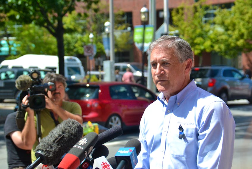Fredericton Mayor Mike O’Brien speaks to media on Saturday. O’Brien expressed condolences for the two police officers killed on Friday morning as well as the two civilians. (Stu Neatby/Saltwire)