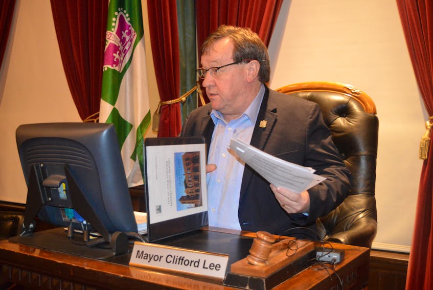Outgoing Charlottetown Mayor Clifford Lee takes his seat for the final time prior to city council’s regular public monthly meeting on Tuesday night. Lee will leave office next month as the longest serving mayor in the city’s history.