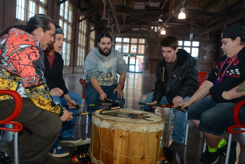 Members of the drum group Hey Cuzzins, from left, Gilbert Sark, Joshua Joseph, Trenton Smith, Ryan Campbell and Parker Larkin, perform during Tuesday’s announcement of a new framework agreement between the province, federal government and P.E.I.’s Mi’kmaq community.