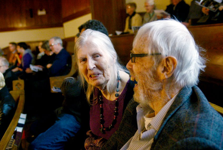Charlottetown couple Jim and Barbara Munves share a laugh while attending a performance by the P.E.I. Symphony at Zion Presbyterian Church on the weekend.
