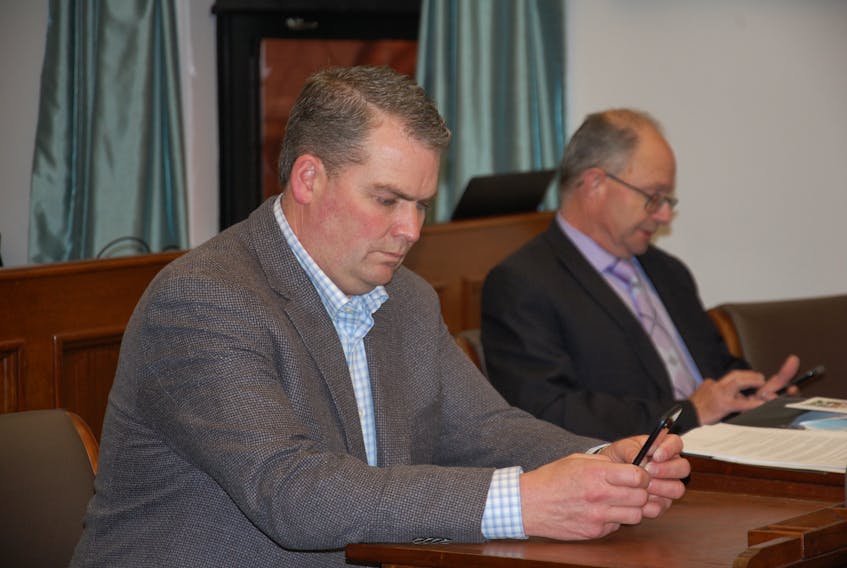 Bloyce Thompson, left, recently appointed as provincial minister of agriculture, justice, public safety and attorney general, was among 10 rookie MLAs, including fellow Progressive Conservative MLA Ernie Hudson, to receive orientation Wednesday of the legislative assembly, which sits twice a year.