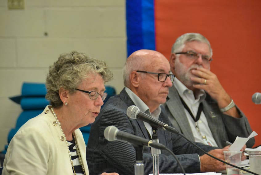 Public Schools Branch board members Susan Willis, Harvey MacEwen and Dale Sabean at a public meeting on Thursday night. The board recommended that a new secondary school be built in Stratford.