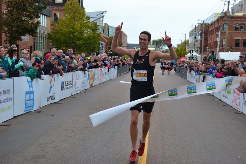 Bear River native Stan Chaisson crosses the finish line at the P.E.I. Marathon on Sunday and defends his 2016 title. Chaisson crossed in a time of 2:35:24, six minutes faster than last year's winning time. Charlottetown's Jocelyn Peterson won the women's division in 3:18:51 for her first Marathon victory.