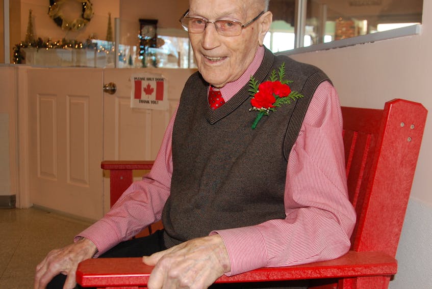 Fred Hughes dressed sharply Friday to mark his 100th birthday. Hughes says he has enjoyed good health his entire life.