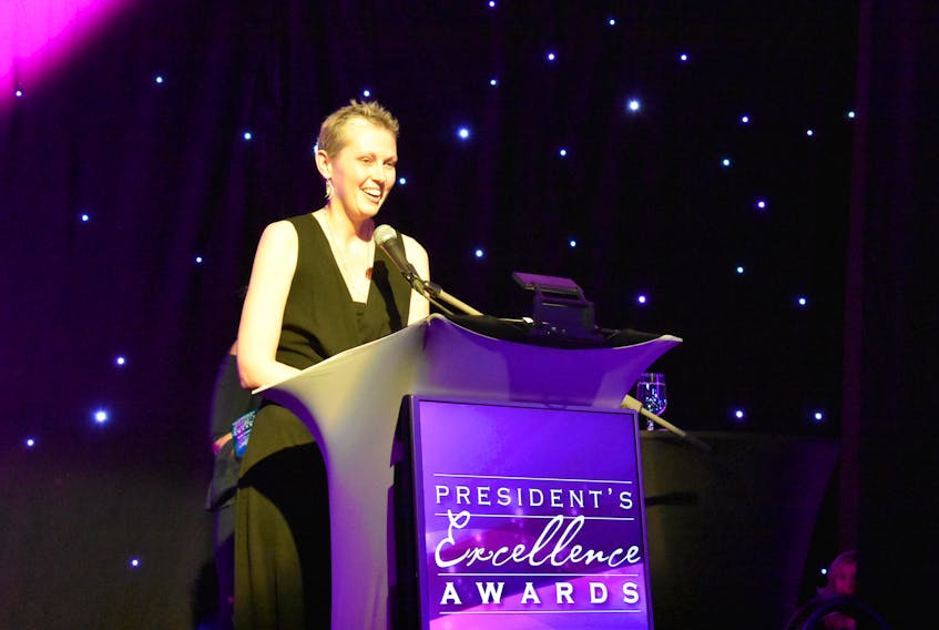 Amber Jadis accepts the first ever People’s Choice for Community Impact Award at the 2018 Greater Charlottetown Area Chamber of Commerce’s President’s Excellence Awards on behalf of Bricks 4 Kidz at the P.E.I. Convention Centre in downtown Charlottetown on Wednesday night. She started the company in Prince Edward Island in 2014.