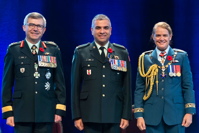 Major Trevor Jain, centre, of Charlottetown was recently honoured with the Order of Military Merit (officer level) in Ottawa by Gov. Gen. Julie Payette. Also pictured is Lt.-Gen. Paul Francis Wynnyk, a Canadian Army officer who served from 2016-18 as commander of the Canadian Army. On July 16, he was named vice-chief of the defence staff. -Sgt Johanie Maheu/Rideau Hall photography