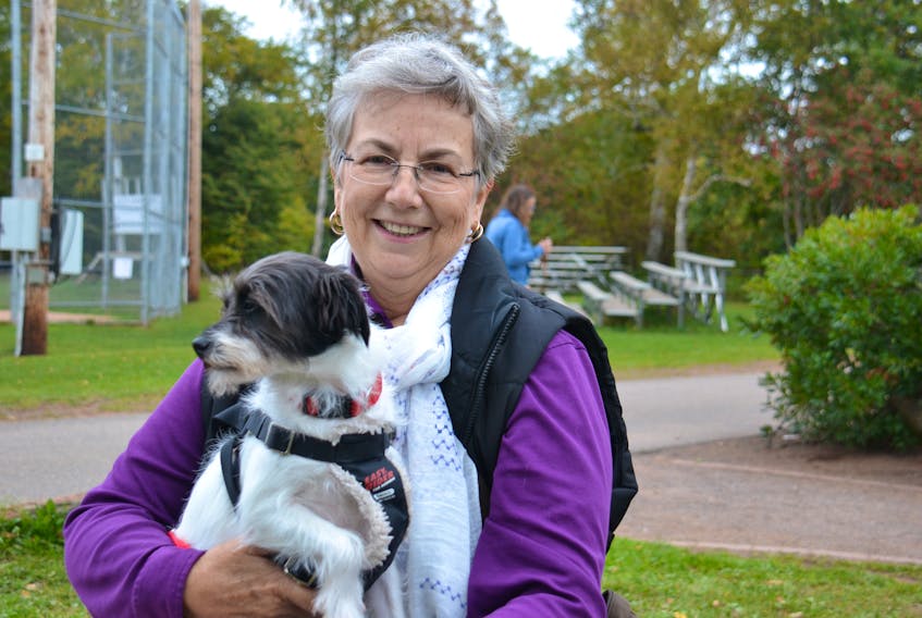 Joan Atkinson of Guernsey Cove took part in the “Pawd in the Park” event Oct. 15 at Victoria Park in Charlottetown with her adopted dog, Pippy. Katie Smith/The Guardian
_________________________________________________________________________________________________________________________________________________________