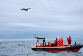 A Lockheed C-130 Hercules four-engine turboprop military transport aircraft joined forces with numerous vessels Wednesday in a large scale mass casualty search and rescue exercise in the waters off Hillsborough Bay.