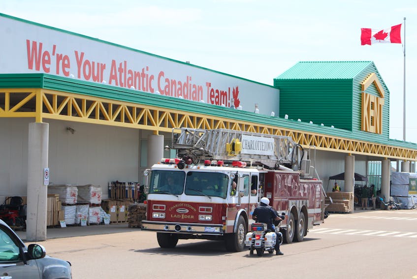 Members of the Charlottetown Fire Department leave the Kent Building Supplies parking lot in Charlottetown after a report of an employee hearing a hissing sound near a propane tank.