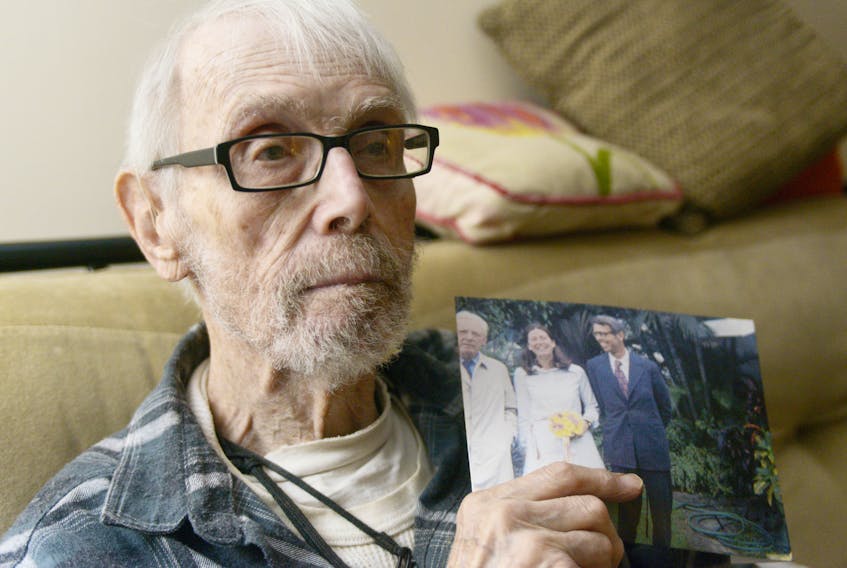 Charlottetown man Jim Munves shows a picture of him and his wife, as well as his late father, on their wedding day in March 1973. Munves is now fighting the province for the right to care for his wife at their Charlottetown home after she was admitted to Atlantic Baptist Home as a permanent resident and the province filed a protective intervention order.