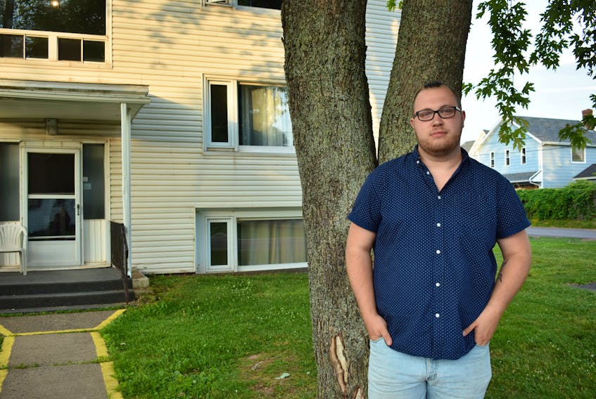 Timothy O’Brien stands outside his home in Charlottetown. O’Brien says dating options are limited in a small province the size of P.E.I. especially for those in the LGBTQ2S+ community.