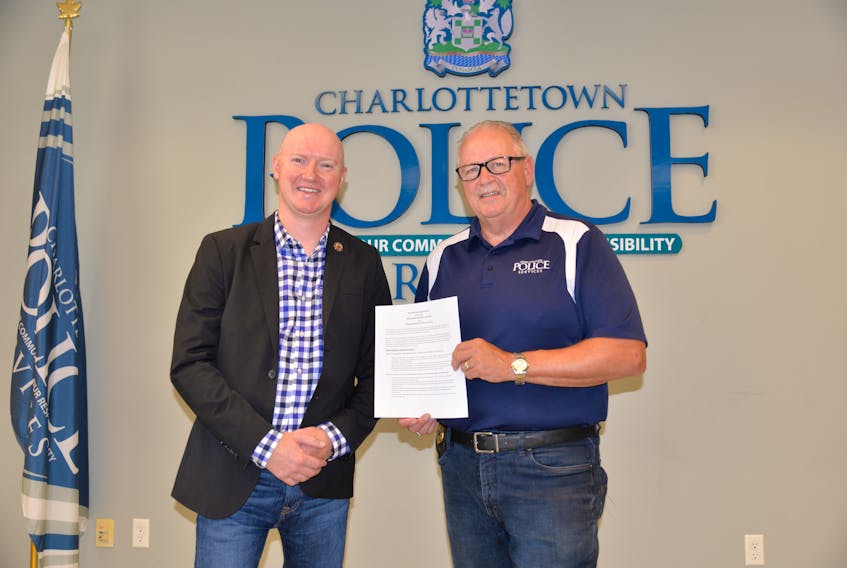 On Friday, the Charlottetown Police Service and Charlottetown Police Association entered into a partnership with Wounded Warriors Canada to access mental health services and programs from the independent organization. In this photo is Scott Maxwell, left, executive director of Wounded Warriors Canada, and Charlottetown Police Chief Paul Smith.