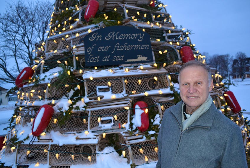 Fr. Albin Arsenault says the impressive Fishermen’s Tree constructed out of lobster traps poignantly reflects the tremendous outpouring of community support in the wake of the boating tragedy in September off North Cape that claimed the lives of two beloved fishermen.