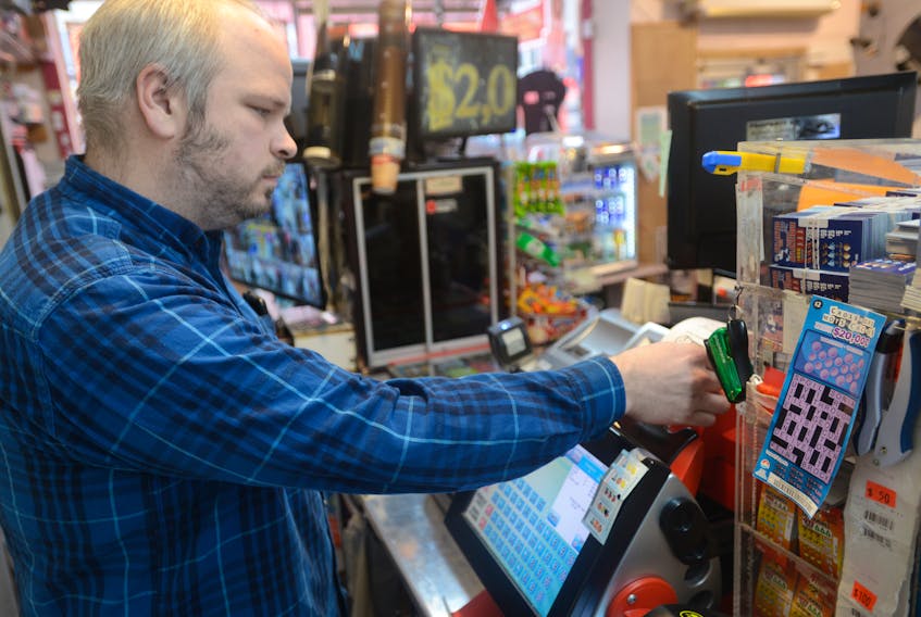 Ian MacDonald, manager of Downtown Convenience in Charlottetown, prints a Lotto 6/49 ticket. No one has come forward yet with the $1 million winning ticket that was sold somewhere in Charlottetown for the Dec. 22, 2018 draw.