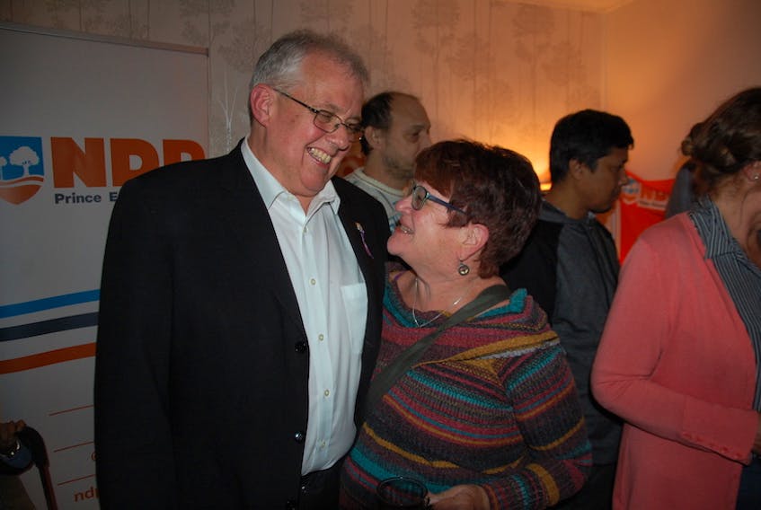 JoeAnne Callaghan, one of the organizer’s for NDP leader Joe Byrne’s campaign, gives Byrne a hug as the leader watched the results come in. Byrne finished last in District 12 Charlottetown-Victoria Park.