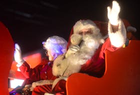 Santa waves out to the crowd during the 2018 Christmas Parade in Charlottetown.