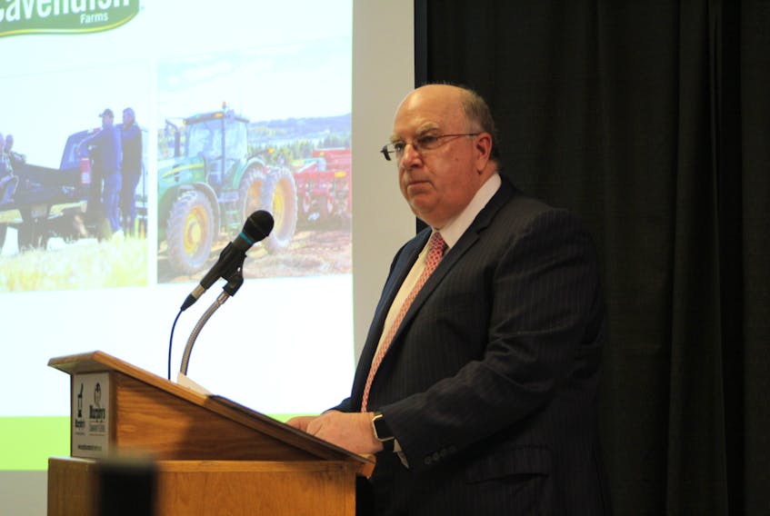 Robert Irving, president of Cavendish Farms, delivers a speech to the P.E.I. Young Farmers Association at Murphy’s Community Centre Saturday. Irving said the company is currently working on developing potatoes that can withstand dry growing conditions.