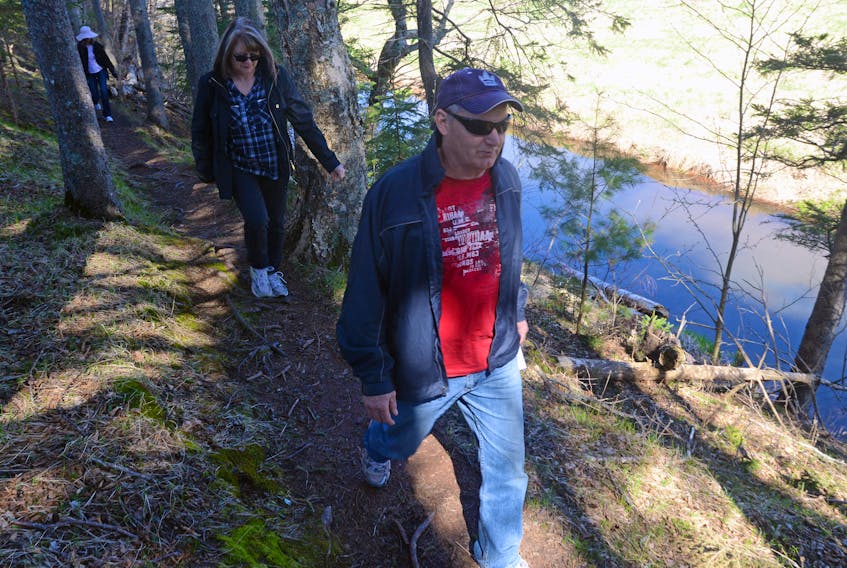Kent and Brenda Biggar, followed by Eileen O’Grady, make their way through the Breadalbane Nature Trail next to the Dunk River as part of the Go! Hike event organized by Go! P.E.I. and Island Trails. The summer hiking series encourages Islanders to enjoy the province’s destination trails during the 25th anniversary of Island Trails.