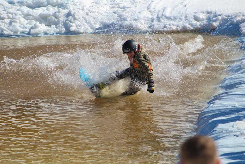 Skylar Gallant is one of many to take a tumble in the water during the aquaneige at the Mark Arendz Provincial Ski Park at Brookvale on Sunday.