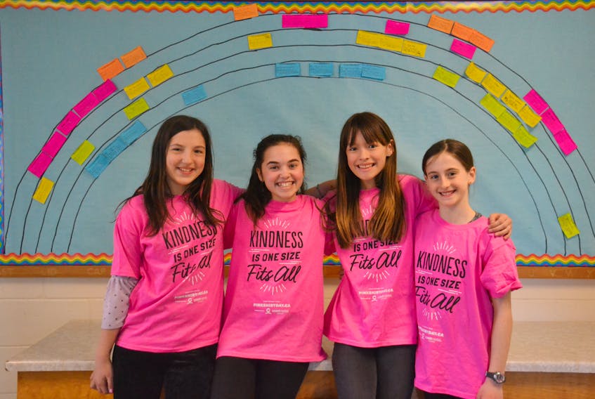 Rainbow Nation Committee promotes positive school initiatives such as Pink Shirt Day. From left, Trinity Montigny, Madison Singleton, Lilly MacVicar and Isabelle MacKinnon, along with six more students, are in the Rainbow Nation Committee at West Kent Elementary School in Charlottetown. Pink Shirt Day was celebrated in Prince Edward Island on Feb. 27 to help prevent bullying and to promote friendship and kindness. - Mitsuki Mori/The Guardian