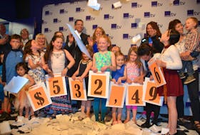 Islanders celebrate at the Eastlink studio in Stratford Sunday evening following the 22nd annual Queen Elizabeth Hospital/Eastlink Telethon as it was announced that $532,496 was raised in just 18 hours.