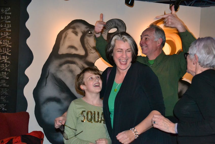 Green party candidate Hannah Bell, second from left, is congratulated by her daughter, Ava, party leader Peter Bevan-Baker and her mother Judith after winning the District 11, Charlottetown-Parkdale byelection on Monday. (Teresa Wright/The Guardian)