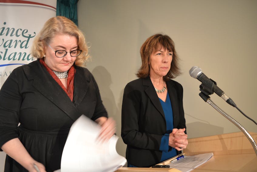 Dr. Heather Keizer, left, a psychiatrist and Health P.E.I.’s chief of mental health and addictions, and Verna Ryan, CAO of mental health and addictions for the province, deliver details in Charlottetown on Tuesday about the province’s $100-million investment in mental health and addictions over the next five years.