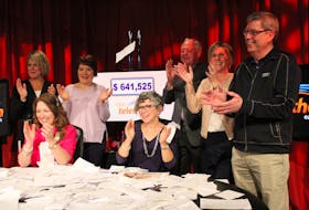 Organizers and announcers celebrate the moment the final totals came in for the 23rd annual Queen Elizabeth Hospital/Eastlink Telethon. This year’s event raised $641,525 for the purchase of a new CT scanner for the hospital’s diagnostic imaging department.