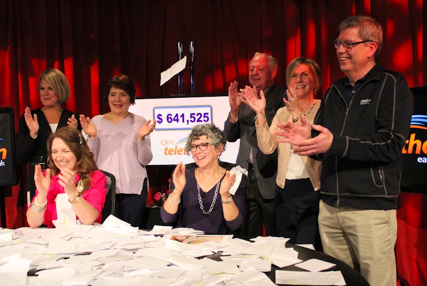 Organizers and announcers celebrate the moment the final totals came in for the 23rd annual Queen Elizabeth Hospital/Eastlink Telethon. This year’s event raised $641,525 for the purchase of a new CT scanner for the hospital’s diagnostic imaging department.