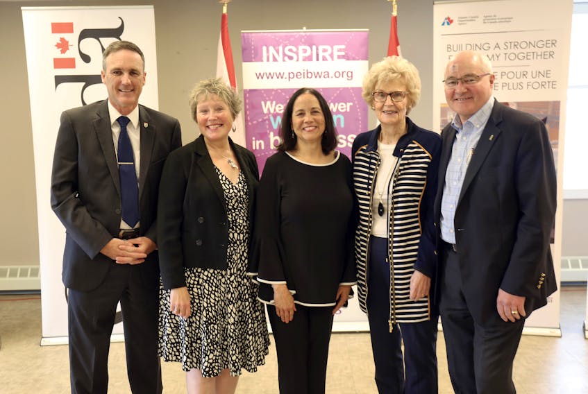 From left, MLA Jamie Fox, Margaret Magner, executive director of PEIBWA, Miriam Vializ Briggs, PEIBWA board president, Catherine Callbeck, PEIBWA board member, and Malpeque MP Wayne Easter for an announcement of funding for the P.E.I. Business Women's Association in Bedeque Wednesday, June 26.