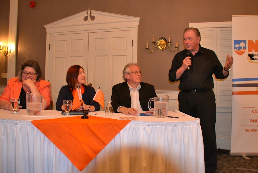 P.E.I. NDP leadership candidates Margaret Andrade, left, Susan MacVittie and Joe Byrne are joined by moderator Dr. Herb Dickieson as they discuss issues that affect Islanders at a March 29 debate in Summerside.