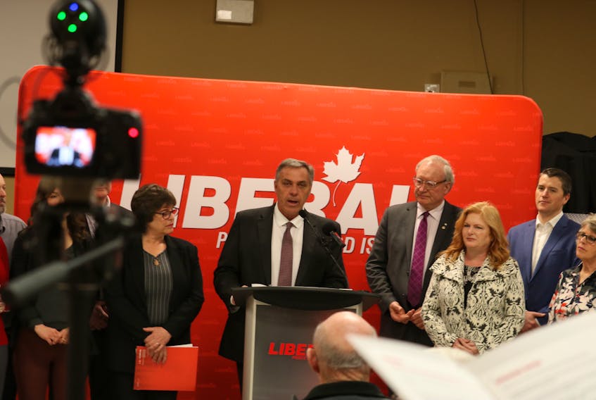 Robert Mitchell, the incumbent health minister, speaks at a party announcement Thursday morning focusing on health care. The Liberals are pledging to increase health spending by $200 million and to improve health services in rural areas.