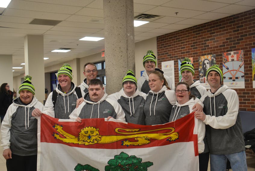 The members of Special Olympics Team P.E.I. Soccer celebrate at the Charlottetown Airport on Wednesday as they get ready to travel to the Yukon to represent the province at the 2019 Special Olympics Yukon Indoor Soccer Invitational. The tournament will be held Feb. 1-3 in Whitehorse and will feature teams from British Columbia, Saskatchewan and the host territory. Nine out of 10 Team P.E.I. members are making the trip, along with three coaches and two mission staff.