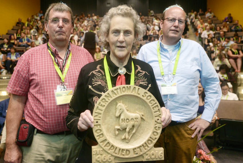 Dr. Temple Grandin, centre, is shown with Dr. Michael Cockram, left, chairman of animal welfare and a professor with the department of health management at the Atlantic Veterinary College, and Dr. Bas Rodenburg, president of the International Society for Applied Ethology, during the society’s 2018 conference in Charlottetown this week. Grandin, a professor of animal science at Colorado State University and world-renowned for her work in animal behaviour and welfare, provided one of the conference’s guest presentations on Tuesday.