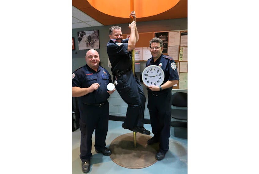 The Charlottetown Fire Department, including firefighters, from left, Brad Kennedy, Bruce Younker and Bobby Chandler, encourage residents to use the end of Daylight Savings Time as a reminder to change the batteries in smoke alarms and update or install new smoke alarms.