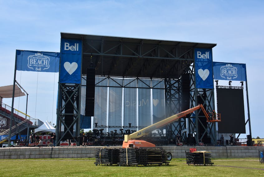 Crew members work at various levels as they erect the stage for the Cavendish Beach Music Festival in Cavendish on Thursday afternoon. By later this afternoon and evening, the grounds for the four-day festival will be filled with thousands attending the 10th season of the concert series.