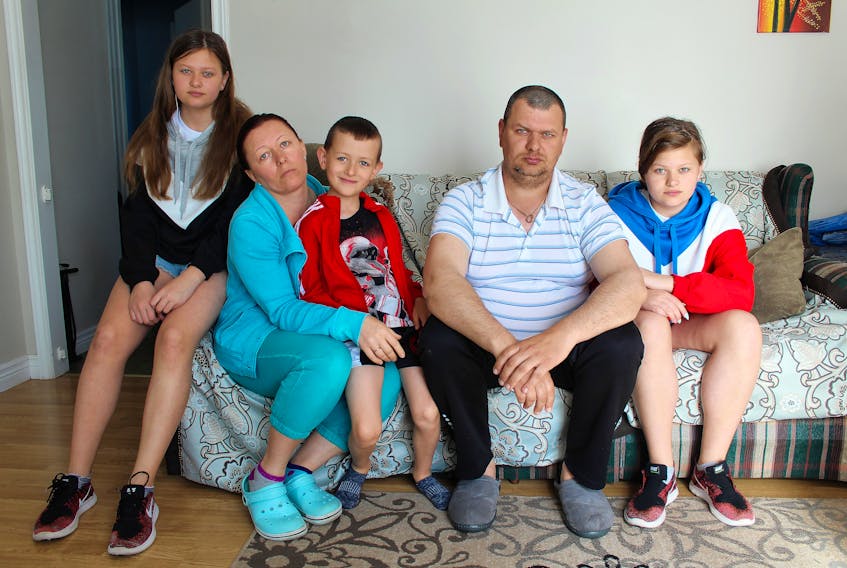 Members of the Zahorodniy family of Charlottetown, from left, Angelika, Olga, Nikita, Vladimir and Veronika, in the Charlottetown home they’ve rented since moving to P.E.I. from Israel in 2015. The family believes it is now being forced out of their home as a “renoviction,” which is a term used by some housing advocates to describe when tenants paying low rental rates are evicted under the guise of renovations.