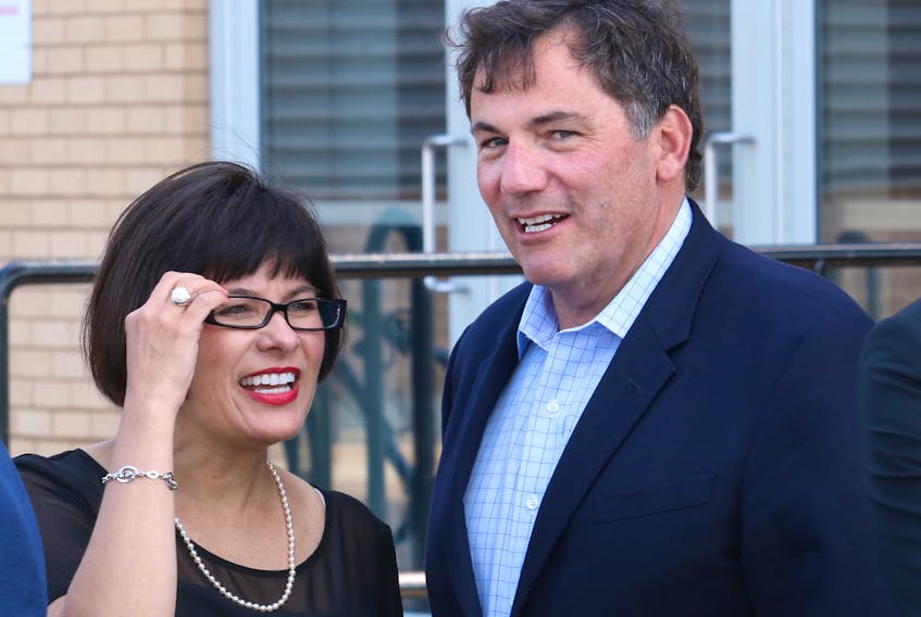 Fisheries and Oceans Minister Dominic LeBlanc, right, chats with Federal Health Minister Ginette Petitpas Taylor at a meeting about the Atlantic Growth Strategy in Summerside on Tuesday.