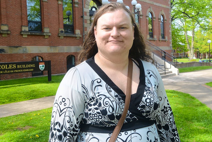 Pride P.E.I. advocacy director Andrea MacPherson stands in front of the Coles Building in Charlottetown, where the group hopes legislation will be introduced at some point this year banning conversion therapy in the province.