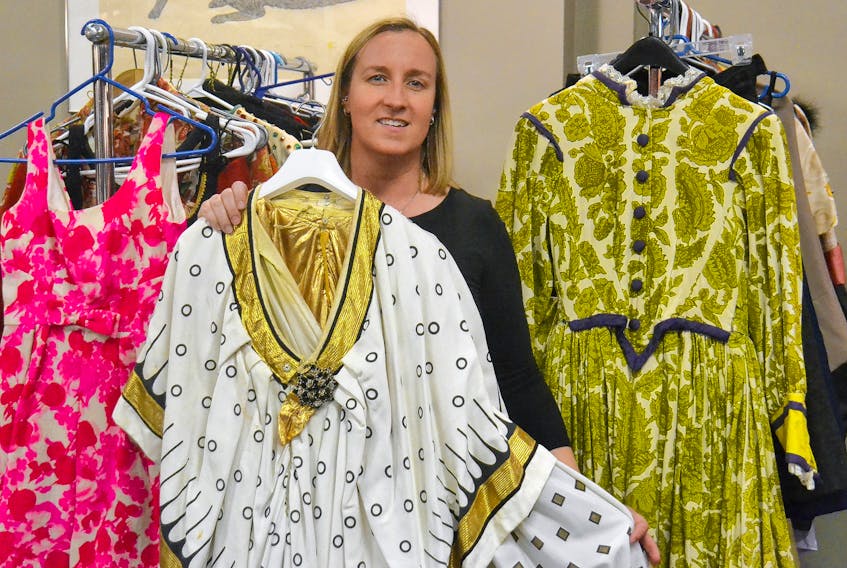 Kellie Knight, production manager at the Confederation Centre of the Arts in Charlottetown, holds one of the costumes up for grabs today when the centre’s costume sale opens its doors to the public. The centre is trying to make room for some of its new costumes by selling off some of its older material.
