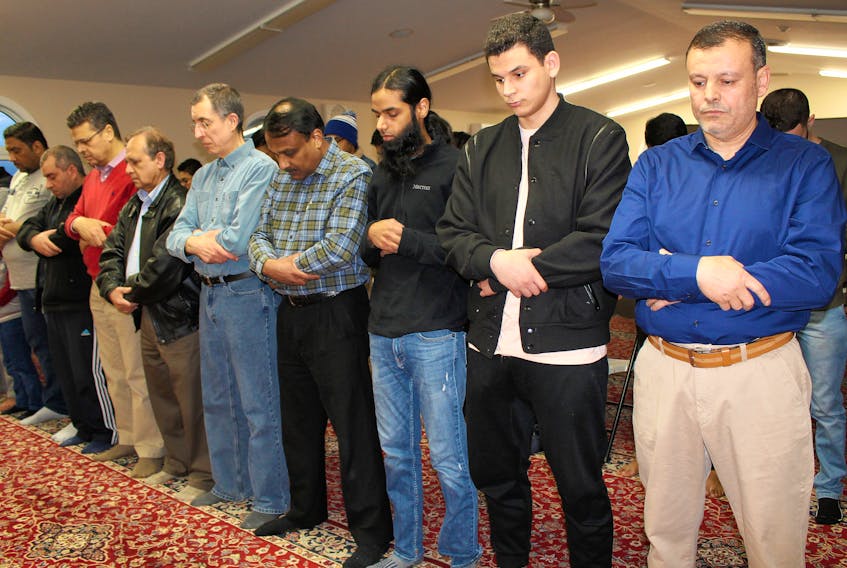 Muslims pray at Charlottetown’s Masjid Dar As-Salam mosque Saturday evening. The mosque has received messages of sympathy following last Thursday’s shooting massacre in New Zealand and is planning on holding a vigil Saturday to honour the victims.