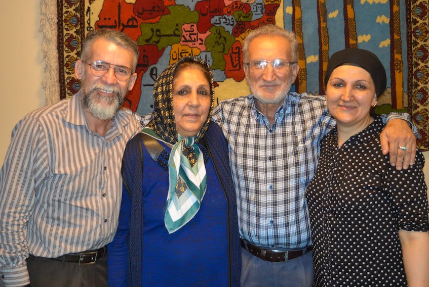 Afghanistan refugee Sara Sadat, right, was recently reunited with her parents, Sayed and Bibi Ozra Fazli, centre, for the first time in 26 years. It took the work of five families together to raise the approximately $10,000 to make it possible, with the help of the Muslim Society of P.E.I. At left is Sara’s husband, Said Akbar Sadat.