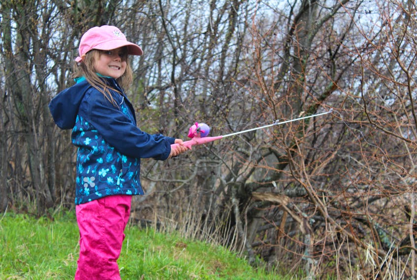 Quinn Kirby, 5, of Cornwall spent time with her family while fishing at Hyde Pond on Saturday. The pond, which was closed following a 2017 fish kill, was re-opened for the long weekend and stocked with trout in hopes that it can stay permanently open for the 2020 fishing season.