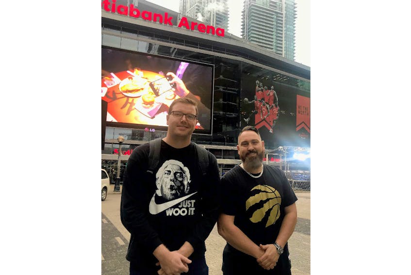 Nathan Clark, left, and Mark MacPhail arrived in Toronto Wednesday morning and are attending Game 1 of the NBA Finals tonight with friend Chad Heron.