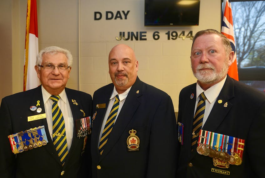Charlottetown Legion 1st vice-president John Yeo, left, president Melvin Ford and Dave Howatt, Queens County zone legion commander and vice-president of the P.E.I. Command, are getting ready for the upcoming D-Day commemorative ceremony. The event will see a parade starting at the legion and a ceremony at the Charlottetown cenotaph at 2 p.m. on June 9.