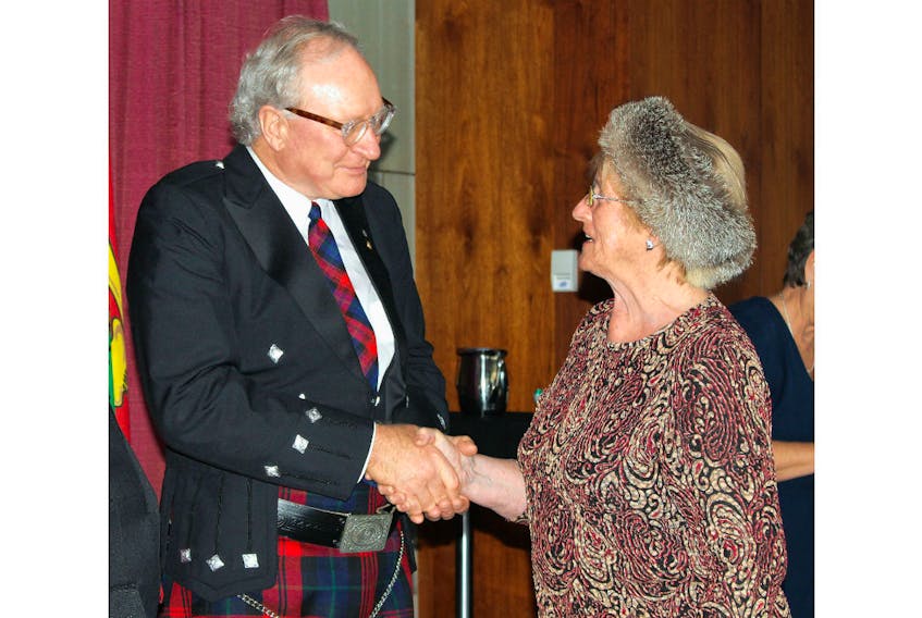 Premier Wade MacLauchlan shakes hands with Dunstaffnage resident Clare Mullen during the levee he hosted at Confederation Centre of the Arts Jan. 13. MacLauchlan greeted hundreds during the traditional levee, which was postponed due to the messy weather on New Year’s Day.