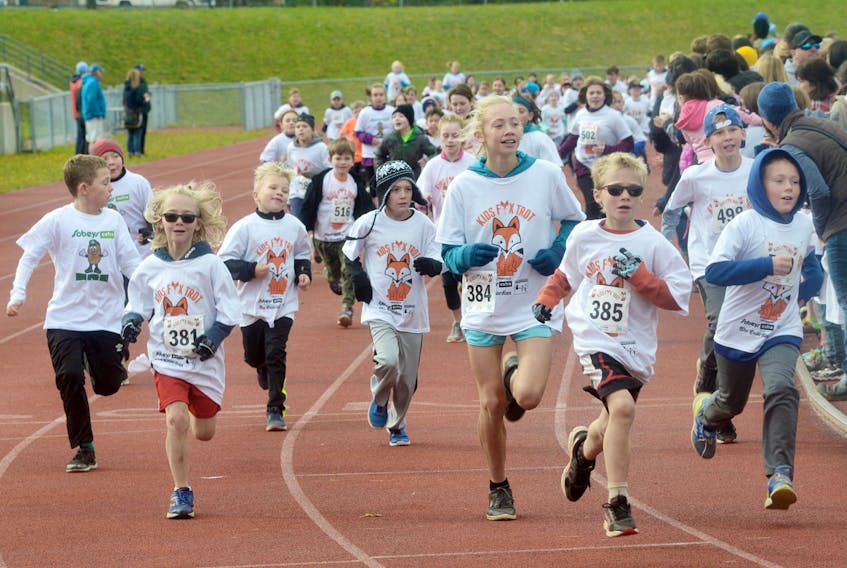 Participants make their way around the outdoor track at UPEI during the inaugural Kids Fox Trot on Saturday. The race, which saw hundreds of participants, was presented by The Guardian and Sobeys Extra as part of this year’s P.E.I. Marathon.
