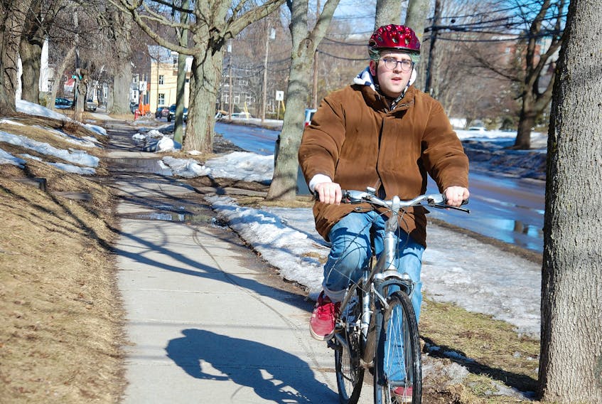 Levi Arsenault, 21, of Charlottetown couldn't wait for the first day of spring Wednesday to return to cycling. He says he has had his bike out a few times over the past week or so – his main mode of transportation in all seasons but winter. Although the calendar says spring has arrived, Islanders can expect rain, wind and maybe even snow at the end of this week as Environment Canada has issued a special weather statement for the entire province, warning of a low-pressure system that is expected to track northeastward towards the Maritimes on Friday, bringing rain, strong winds and potentially some snow beginning Friday and ending during the day Saturday. JIM DAY/THE GUARDIAN