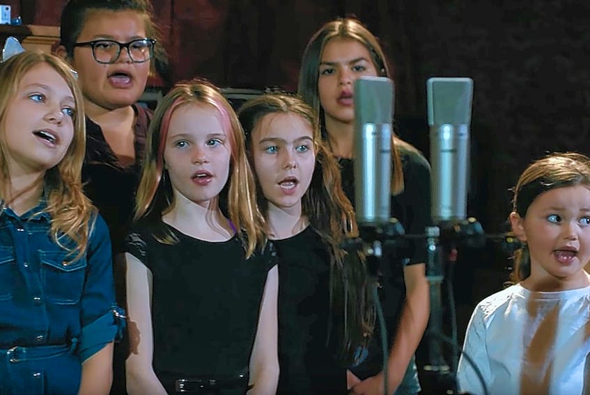 This screengrab from Periscope Picture’s video, “Oh Kanata”, shows children from Mount Stewart Consolidated School recording a Mi’kmaq version of O Canada at Dunk River Sound Studio.