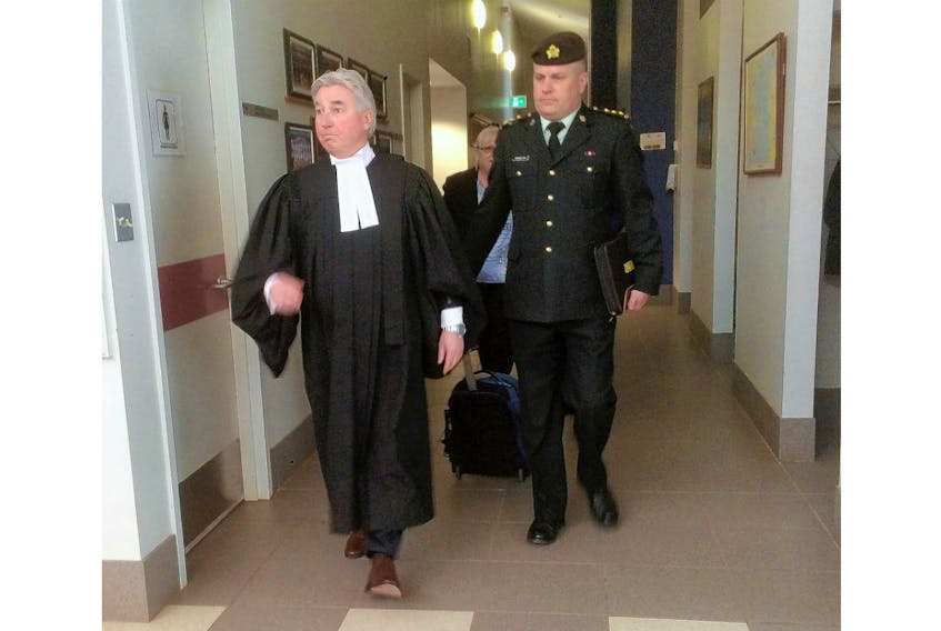 Todd Bannister, right, and his defence lawyer J.L.P.L. Boutin leave a court martial in Charlottetown in February 2018. Bannister was found not guilty on two counts of behaving in a disgraceful manner and two counts of conduct to the prejudice of good order and discipline. Bannister will be heading back to court after an appeal was recently granted.